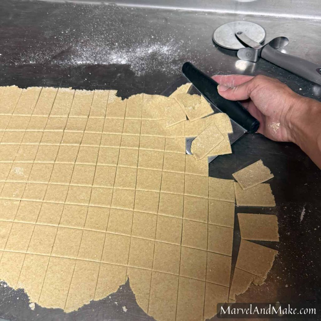 Bench scraper for lifting or cutting dumplings for Homemade Chicken and Dumplings from Marvel and Make